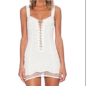 For Love & Lemons she’s a knockout slip dress